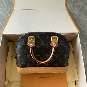 Louis Vuitton mini alma signature bag